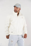 Buzo tipo sudadera hueso con cuello alto y broches metálicos